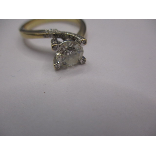 8 - An 18ct yellow gold diamond ring, having milli-grain diamonds to mounts and a central stone measurin... 