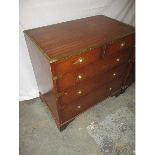 324 - A contemporary campaign style mahogany and brass chest of drawers and bedside cabinet. Approximate d... 