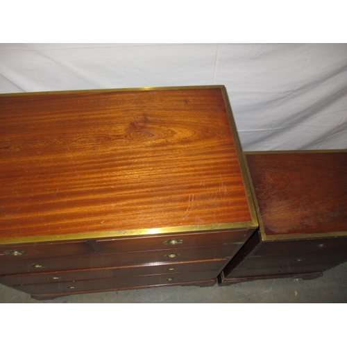 324 - A contemporary campaign style mahogany and brass chest of drawers and bedside cabinet. Approximate d... 