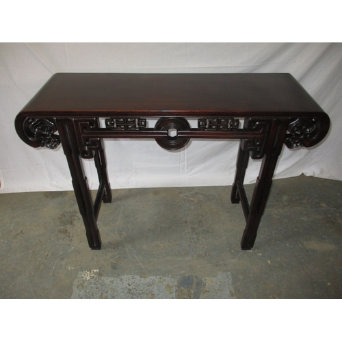 320 - A contemporary oriental style hard wood hall table,  in good pre-owned condition with small mark to ... 