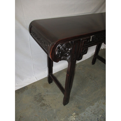 320 - A contemporary oriental style hard wood hall table,  in good pre-owned condition with small mark to ... 