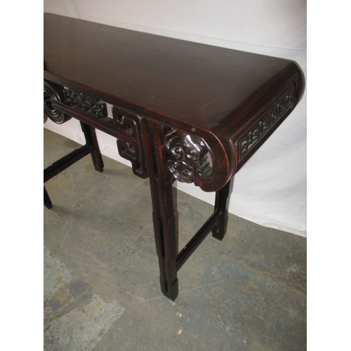 320 - A contemporary oriental style hard wood hall table,  in good pre-owned condition with small mark to ... 