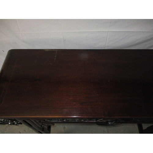 320 - A contemporary oriental style hard wood hall table,  in good pre-owned condition with small mark to ... 