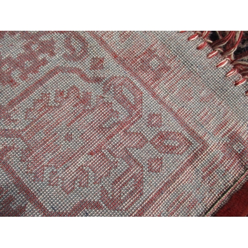 315 - A vintage wool and silk rug. In good pre-owned condition, a fine quality item. Approximate dimension... 