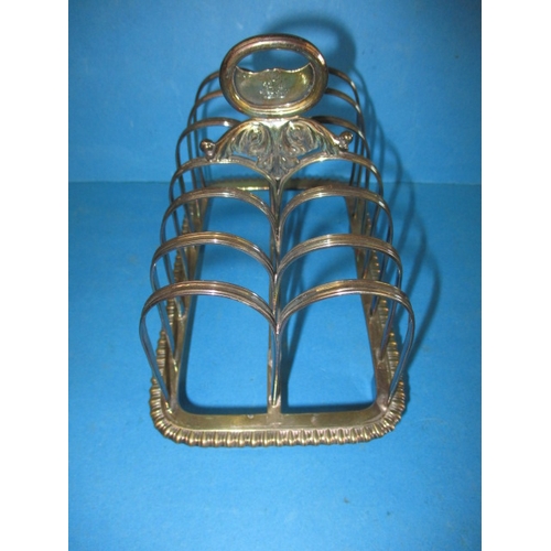 192 - A George III sterling silver toast rack date marked 1819/20, approx. weight 395g makers mark WE, in ... 