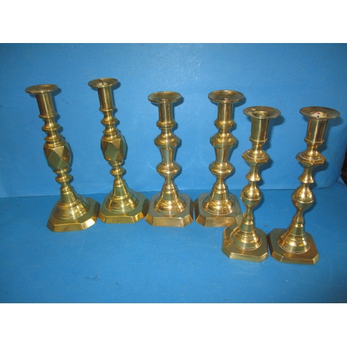 289 - 3 Pairs of Victorian brass candlesticks, to include a Diamond Princess pair, all in useable pre-owne... 