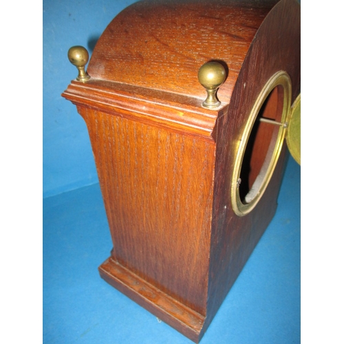 296 - A vintage oak cased mantle clock, with French movement, having general age-related marks and not run... 