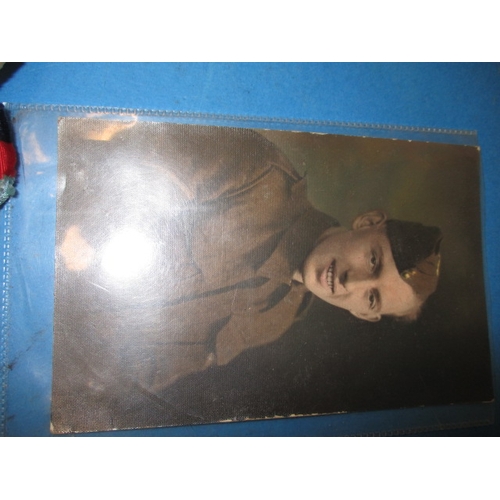 247 - A 1945 dated British Airborne RASC maroon Kangol beret with cap badge, medals and photo, all in used... 