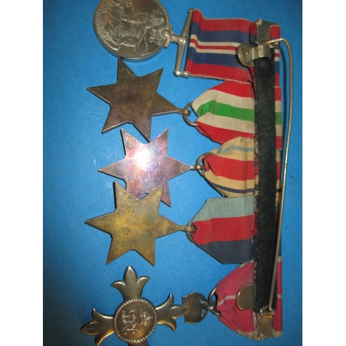 242 - WWII Royal Engineers medal group to include MBE, with photos and badges, all in used condition