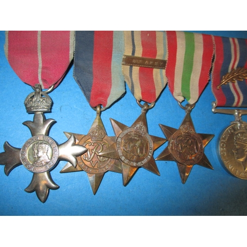 242 - WWII Royal Engineers medal group to include MBE, with photos and badges, all in used condition