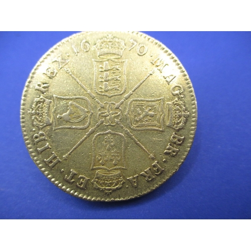 162 - A Charles II gold 5 Guinea coin dated 1670, approx. weight 41.65g, approx. diameter 36.3mm, a circul... 