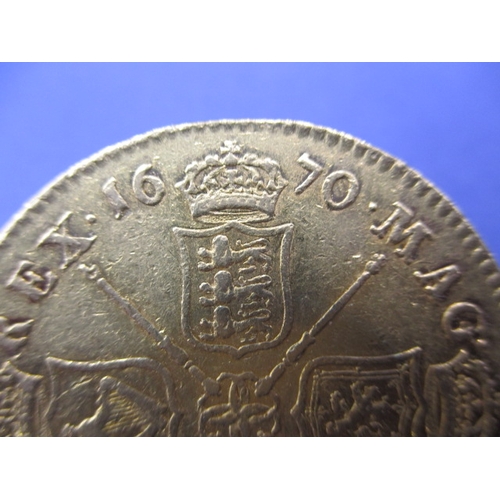 162 - A Charles II gold 5 Guinea coin dated 1670, approx. weight 41.65g, approx. diameter 36.3mm, a circul... 