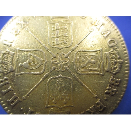 162 - A Charles II gold 5 Guinea coin dated 1670, approx. weight 41.65g, approx. diameter 36.3mm, a circul... 