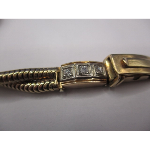 102 - A 9ct gold Jaeger LeCoultre bracelet watch  with diamonds and gem stones to strap, in working order.... 