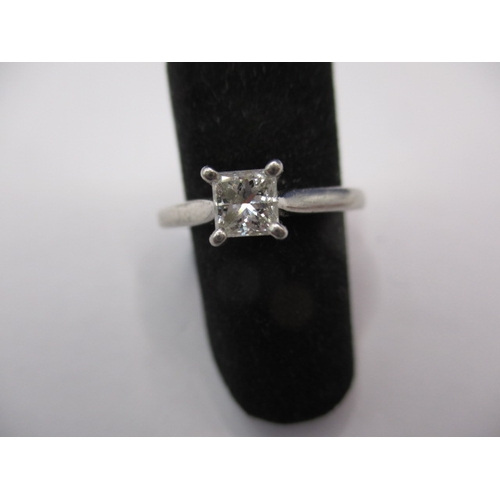 25 - A vintage 950 platinum and diamond solitaire ring, the square cut stone measuring approx. 4.2mm, app... 