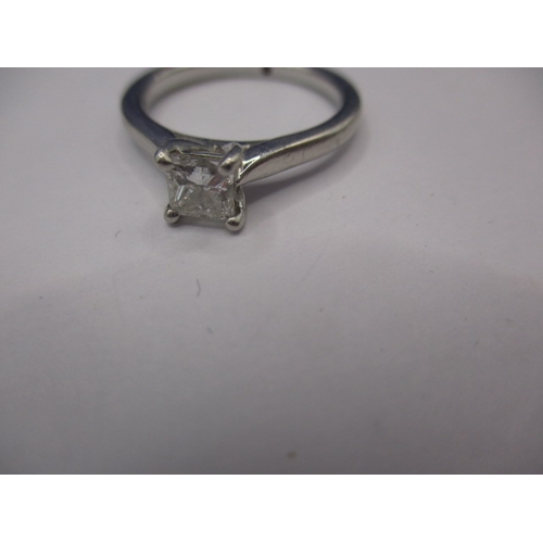 25 - A vintage 950 platinum and diamond solitaire ring, the square cut stone measuring approx. 4.2mm, app... 