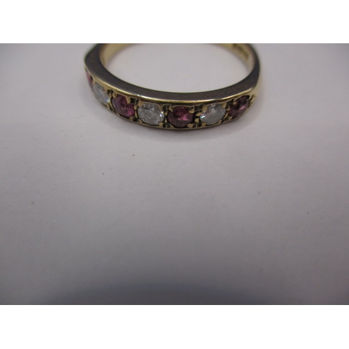 34 - A 9ct yellow gold diamond and ruby half eternity ring, approx. ring size ‘O’, approx. weight 2.3g in... 