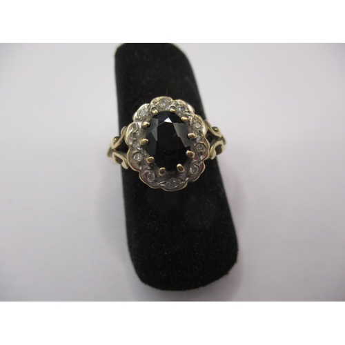 35 - A 9ct yellow gold, diamond and sapphire dress ring, approx. ring size ‘L’, approx. weight 2.3g in go... 