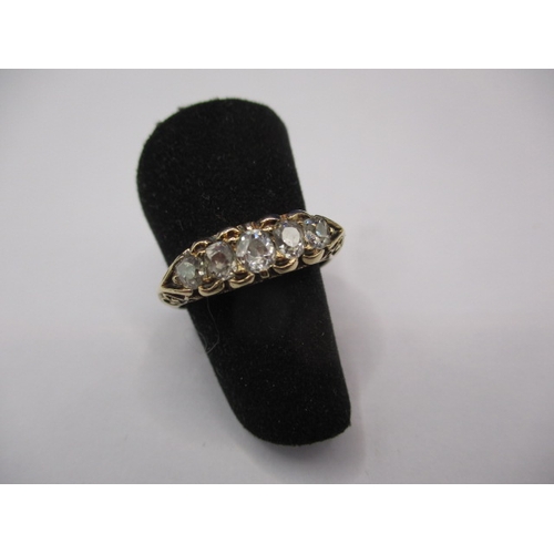 12 - An antique 15ct yellow gold and diamond ring, having 5 graduated old cut diamonds, approx. ring size... 