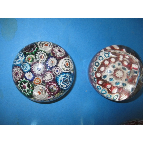 277 - A parcel of vintage millefiori glass paperweights, one badly cracked and one with some small chips, ... 