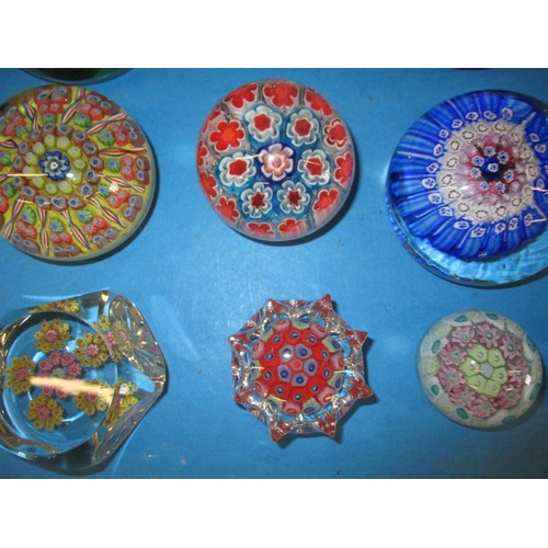 277 - A parcel of vintage millefiori glass paperweights, one badly cracked and one with some small chips, ... 