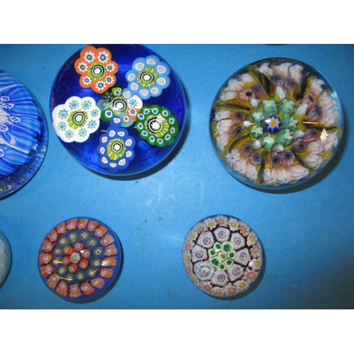 277 - A parcel of vintage millefiori glass paperweights, one badly cracked and one with some small chips, ... 