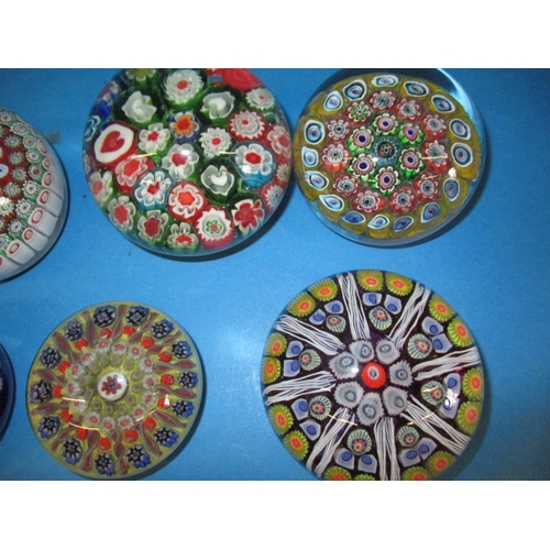 277 - A parcel of vintage millefiori glass paperweights, one badly cracked and one with some small chips, ... 