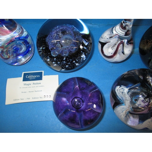 278 - A quantity of collectable Scottish glass paperweight, to include examples by Caithness, Selkirk and ... 