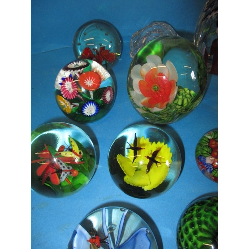 279 - A quantity of vintage glass paperweights, mostly floral designs, all in pre-owned condition with no ... 