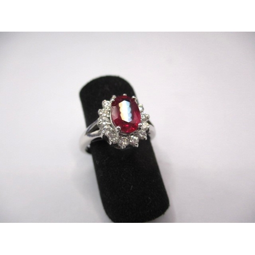 40 - A 14k white gold diamond and ruby ring, approx. ring size ‘J+’, approx. size of ruby 8x6mm, approx. ... 