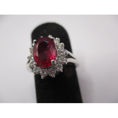 40 - A 14k white gold diamond and ruby ring, approx. ring size ‘J+’, approx. size of ruby 8x6mm, approx. ... 