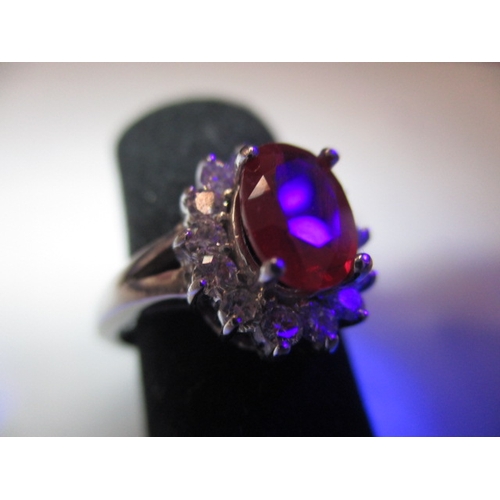 40 - A 14k white gold diamond and ruby ring, approx. ring size ‘J+’, approx. size of ruby 8x6mm, approx. ... 