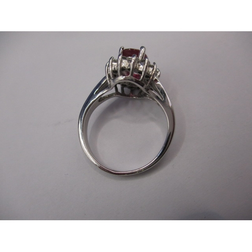 40 - A 14k white gold diamond and ruby ring, approx. ring size ‘J+’, approx. size of ruby 8x6mm, approx. ... 