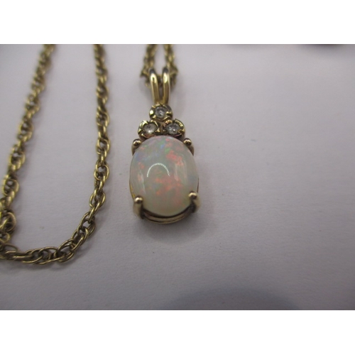 83 - A 9ct yellow gold necklace with opal pendant and matching earrings, approx. gross parcel weight 5.1g... 