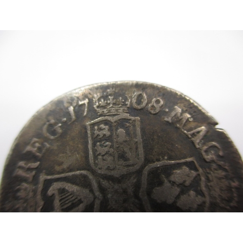 165 - A Queen Anne shilling dated 1708, a circulated coin with very fine definition of features