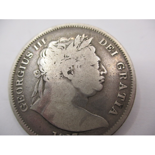 169 - A George III silver half crown dated 1817, a circulated coin with fine definition of features