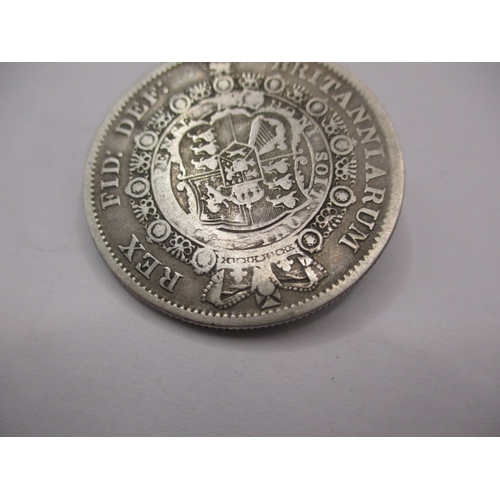 169 - A George III silver half crown dated 1817, a circulated coin with fine definition of features