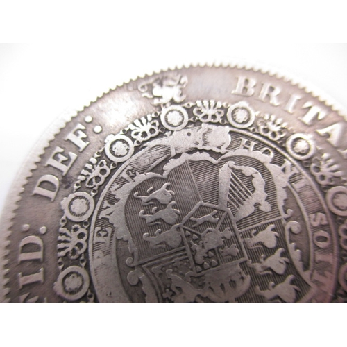 169 - A George III silver half crown dated 1817, a circulated coin with fine definition of features