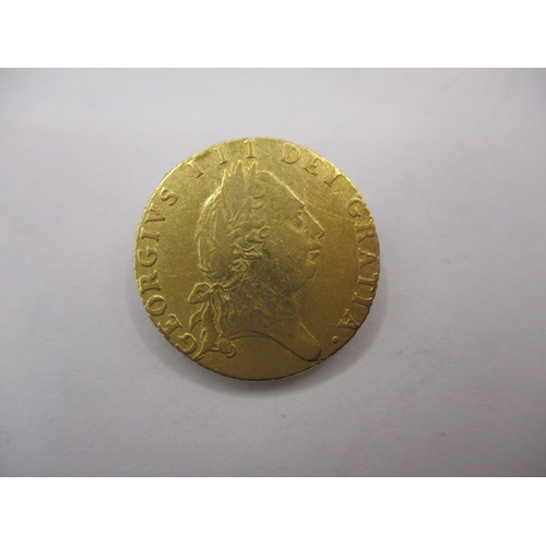 149 - A George III gold half spade guinea dated 1790, a circulated coin with very fine definition of featu... 