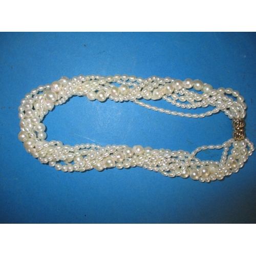 223 - A six strand baroque pearl necklace with 9ct gold clasp, approx. linear length 38cm, in good useable... 