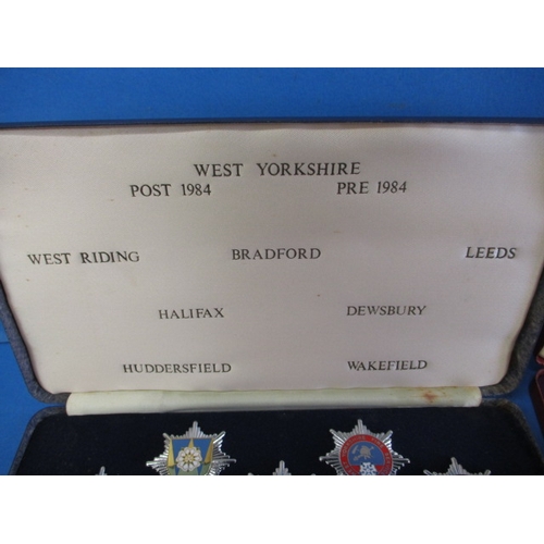 271 - Two vintage limited edition boxed set fire service cap badges, one for London the other West Yorkshi... 