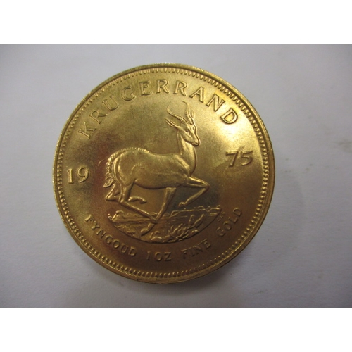 161 - A 1975 gold Krugerrand in near uncirculated condition, approx. weight 34g