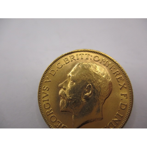 154 - A George V gold sovereign dated 1911, a circulated coin with very fine definition of features