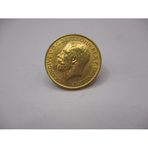 155 - A George V gold sovereign dated 1912, a circulated coin with very fine definition of features