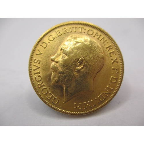 155 - A George V gold sovereign dated 1912, a circulated coin with very fine definition of features