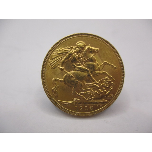 155 - A George V gold sovereign dated 1912, a circulated coin with very fine definition of features