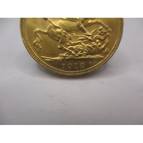 155 - A George V gold sovereign dated 1912, a circulated coin with very fine definition of features