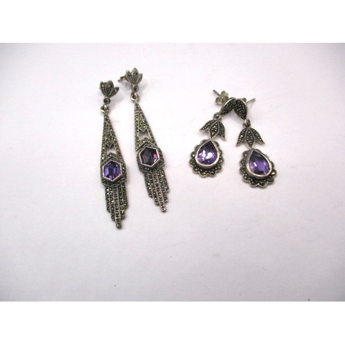 222 - A pair of art deco style earrings silver, marcasite amethyst on silver and another similar pair, in ... 