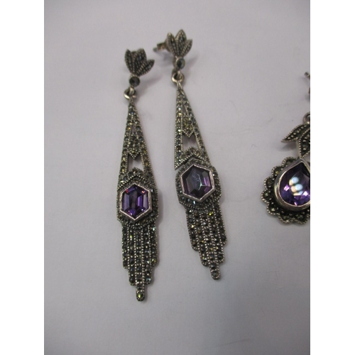 222 - A pair of art deco style earrings silver, marcasite amethyst on silver and another similar pair, in ... 