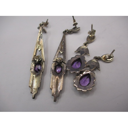 222 - A pair of art deco style earrings silver, marcasite amethyst on silver and another similar pair, in ... 